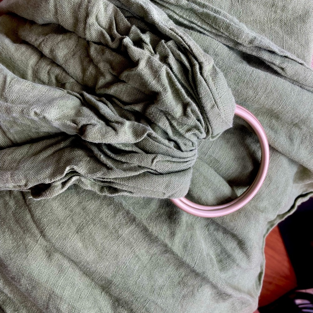 Green linen infant ring sling from wildbird